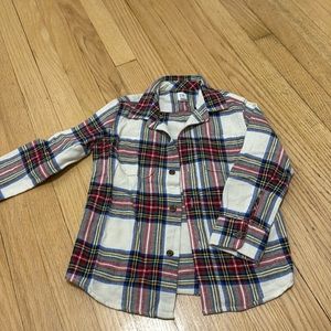 Plaid, flannel, button down shirt. Two front pockets (on top)